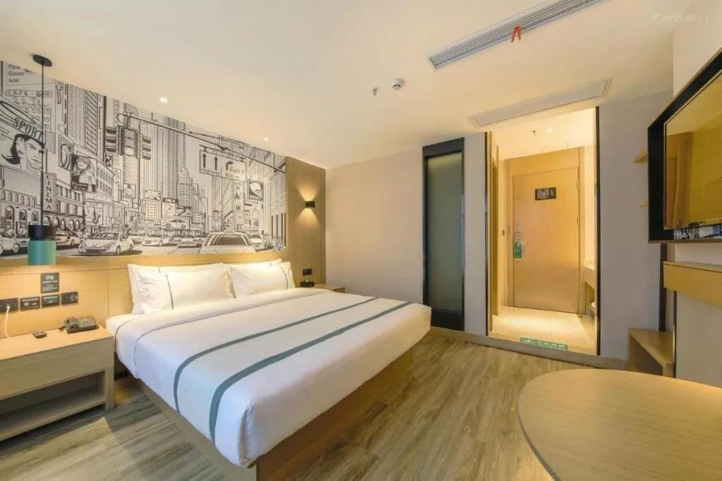 Bed in City Comfort Inn Zhongshan Nanqu Subdistrict Yong'an Square