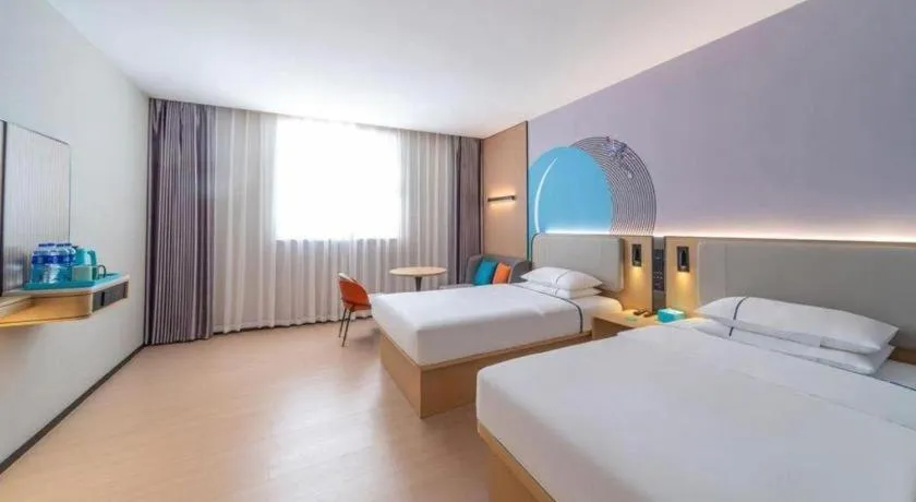 Bed in City Comfort Inn Zhongshan Nanqu Subdistrict Yong'an Square