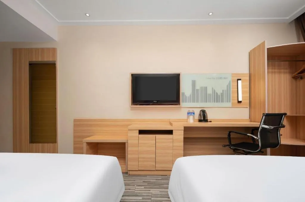 Bed in City Comfort Inn Wuhan Huanghe Tower Shouyi Metro Station