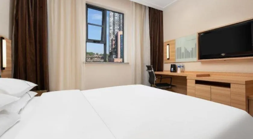 Bed in City Comfort Inn Wuhan Huanghe Tower Shouyi Metro Station