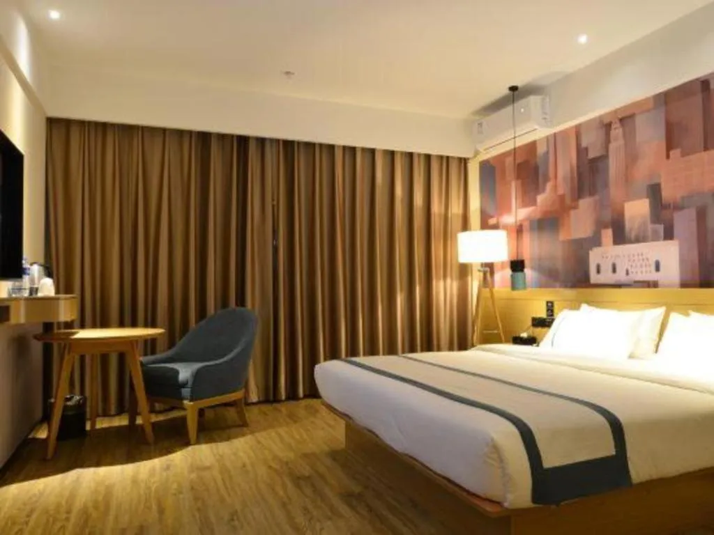Bed in City Comfort Inn Wuhan Optics Valley OuYada Yangjiawan Metro Station