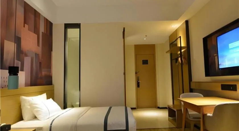 Bed in City Comfort Inn Wuhan Optics Valley OuYada Yangjiawan Metro Station