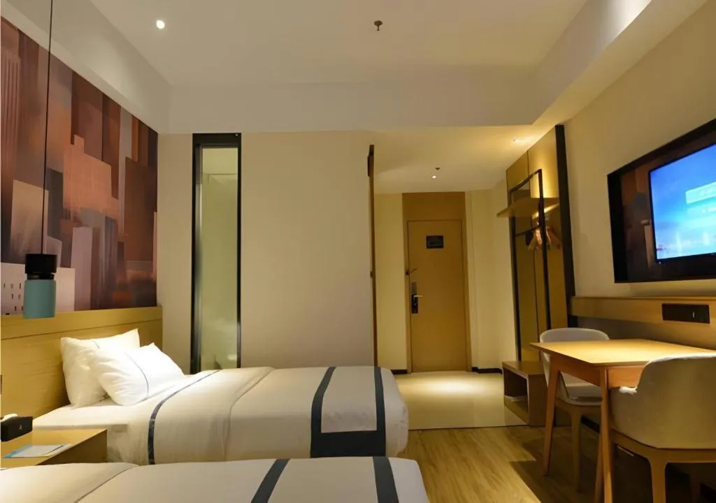 Bed in City Comfort Inn Wuhan Optics Valley OuYada Yangjiawan Metro Station