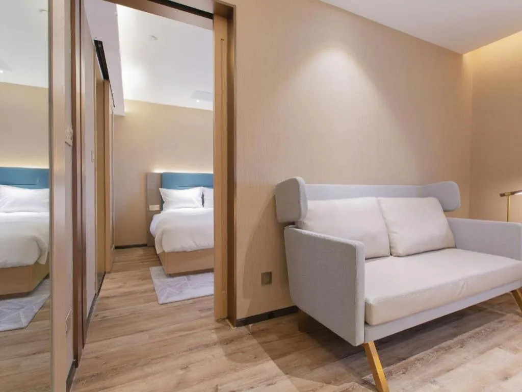 Bed in ZMAX Hotels Shenzhen Lianhuacun Metro Station