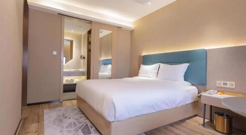 Bed in ZMAX Hotels Shenzhen Lianhuacun Metro Station