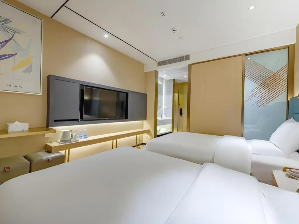 Bed in ZMAX Hotels Shenzhen Lianhuacun Metro Station