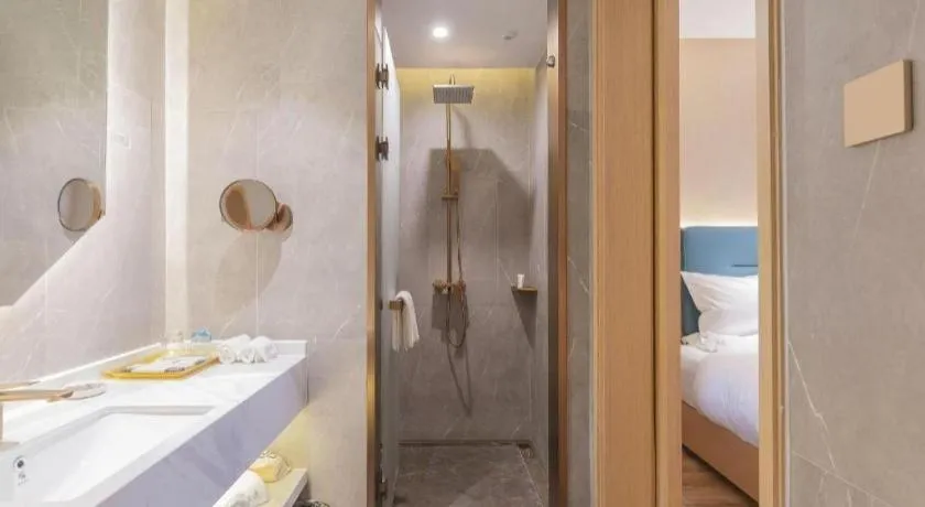 Bed in ZMAX Hotels Shenzhen Lianhuacun Metro Station