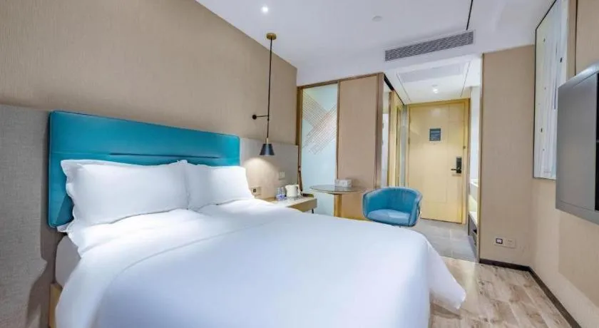 Bed in ZMAX Hotels Shenzhen Lianhuacun Metro Station