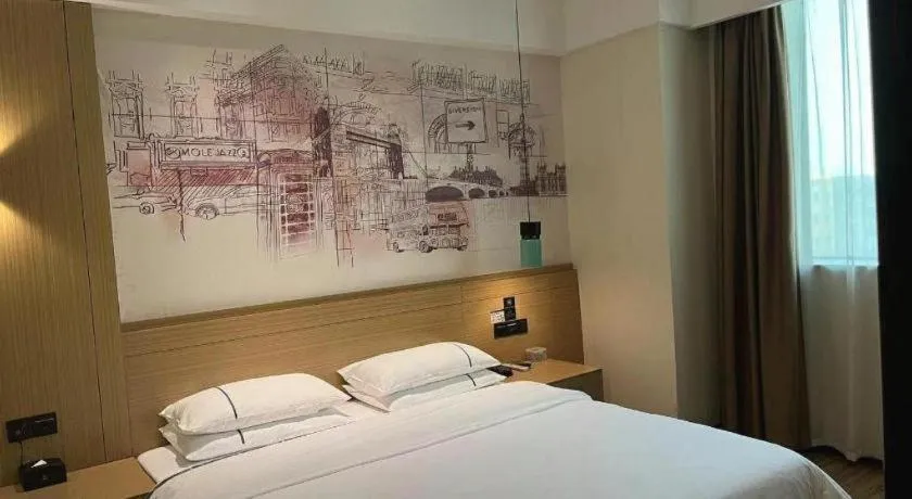 Bed in City Comfort Inn Dongguan Wangniudun