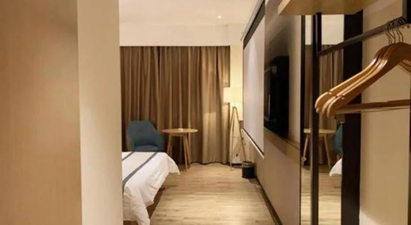 Bed in City Comfort Inn Dongguan Wangniudun