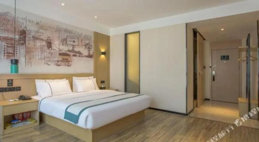 Bed in City Comfort Inn Dongguan Wangniudun