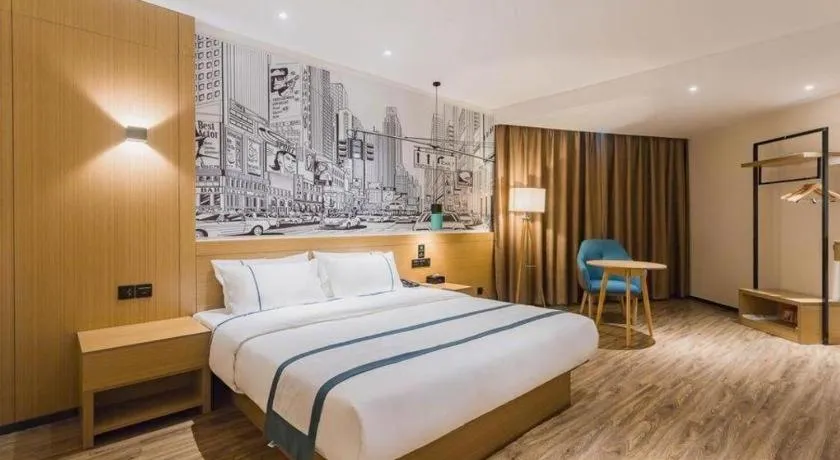 Bed in City Comfort Inn Dongguan Wangniudun