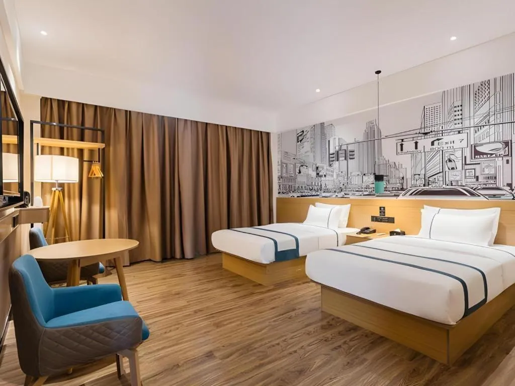 Bed in City Comfort Inn Dongguan Wangniudun