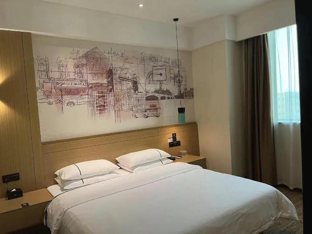 Bed in City Comfort Inn Dongguan Wangniudun