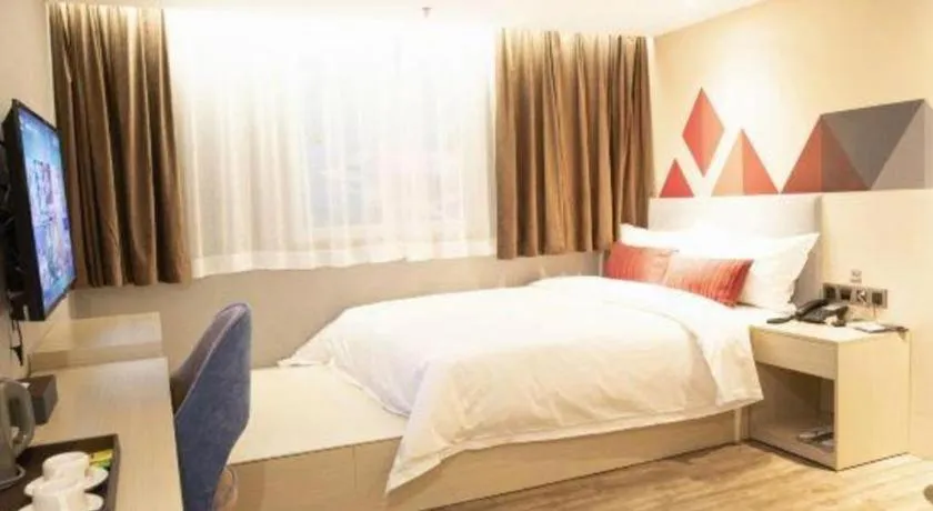 Bed in Borrman Hotel Dongguan Houjie Wanda Plaza Liaoxia Metro Station