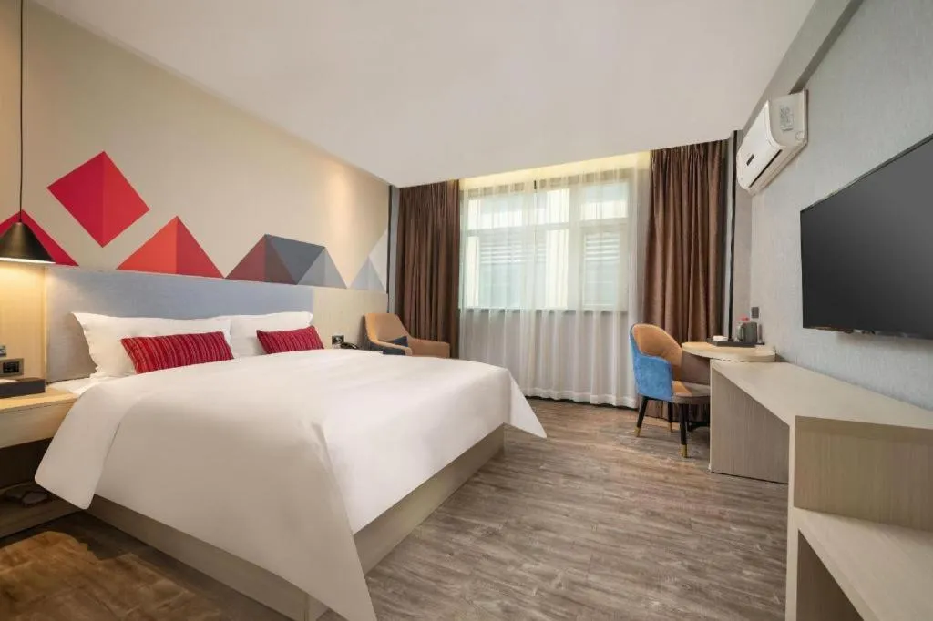 Bed in Borrman Hotel Dongguan Houjie Wanda Plaza Liaoxia Metro Station