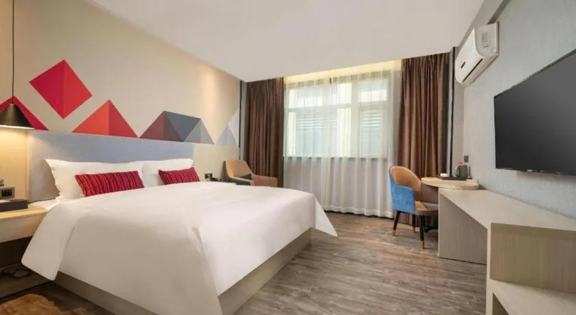 Bed in Borrman Hotel Dongguan Houjie Wanda Plaza Liaoxia Metro Station