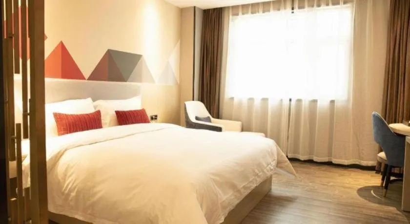 Bed in Borrman Hotel Dongguan Houjie Wanda Plaza Liaoxia Metro Station