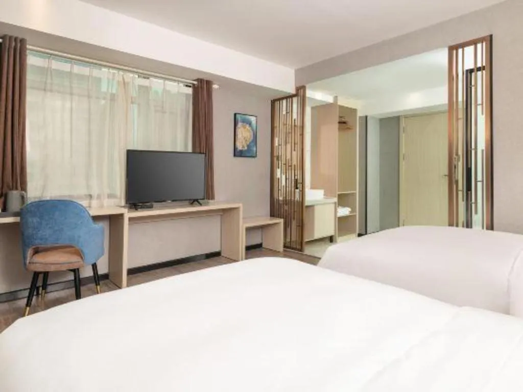 Bed in Borrman Hotel Dongguan Houjie Wanda Plaza Liaoxia Metro Station