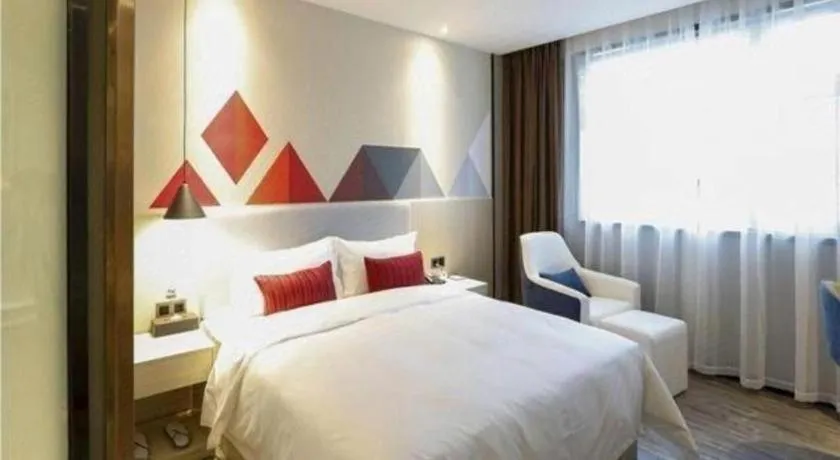 Bed in Borrman Hotel Dongguan Houjie Wanda Plaza Liaoxia Metro Station