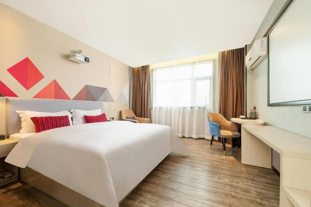 Bed in Borrman Hotel Dongguan Houjie Wanda Plaza Liaoxia Metro Station