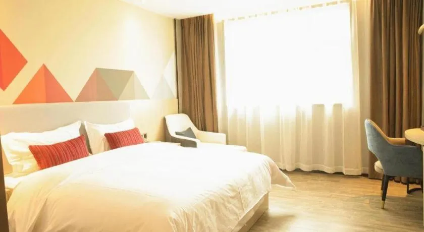 Bed in Borrman Hotel Dongguan Houjie Wanda Plaza Liaoxia Metro Station