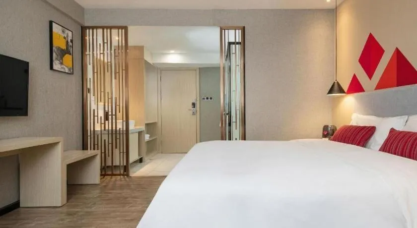 Bed in Borrman Hotel Dongguan Houjie Wanda Plaza Liaoxia Metro Station