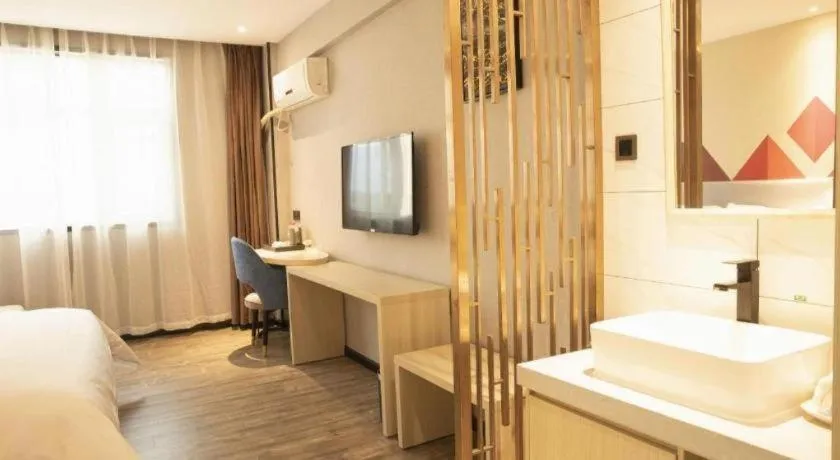 Bed in Borrman Hotel Dongguan Houjie Wanda Plaza Liaoxia Metro Station