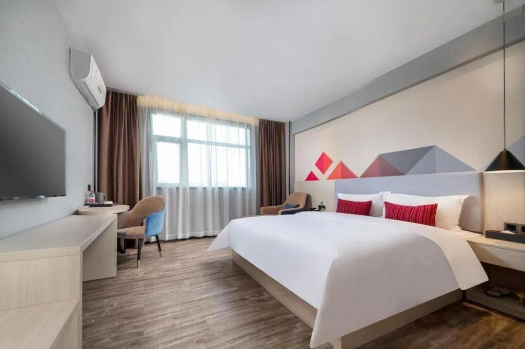 Bed in Borrman Hotel Dongguan Houjie Wanda Plaza Liaoxia Metro Station