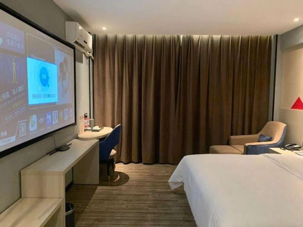 Bed in Borrman Hotel Dongguan Houjie Wanda Plaza Liaoxia Metro Station