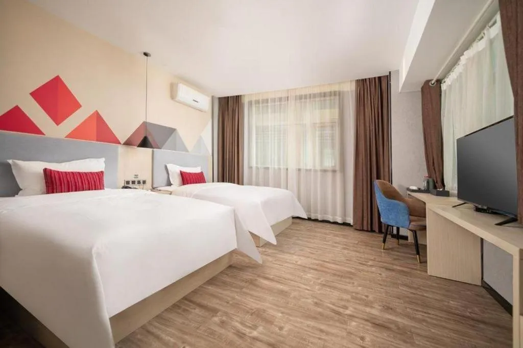 Bed in Borrman Hotel Dongguan Houjie Wanda Plaza Liaoxia Metro Station