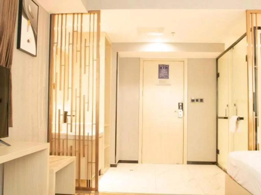 Bed in Borrman Hotel Dongguan Houjie Wanda Plaza Liaoxia Metro Station