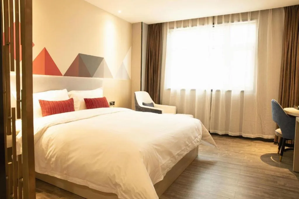 Bed in Borrman Hotel Dongguan Houjie Wanda Plaza Liaoxia Metro Station