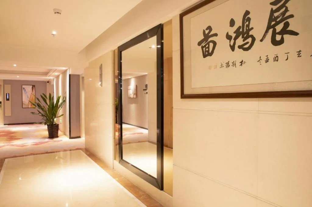 Bed in Borrman Hotel Dongguan Houjie Wanda Plaza Liaoxia Metro Station