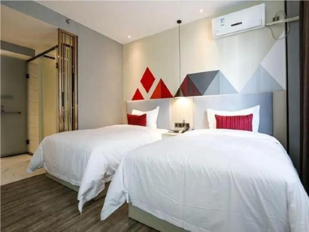 Bed in Borrman Hotel Dongguan Houjie Wanda Plaza Liaoxia Metro Station