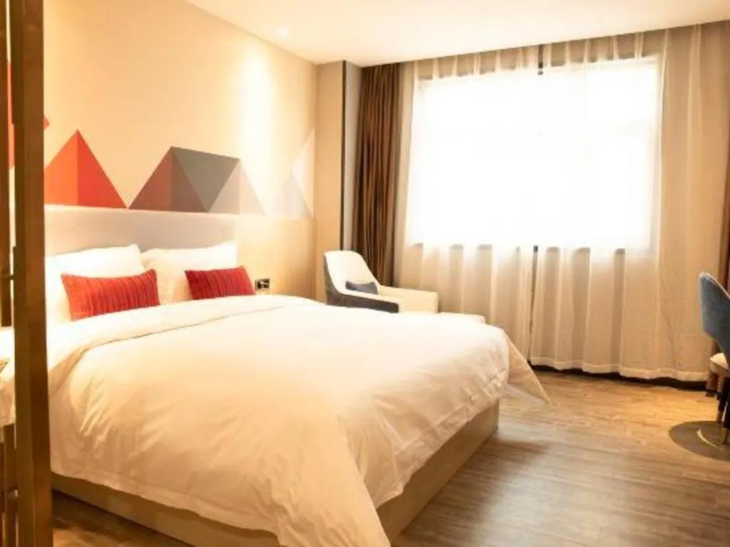 Bed in Borrman Hotel Dongguan Houjie Wanda Plaza Liaoxia Metro Station