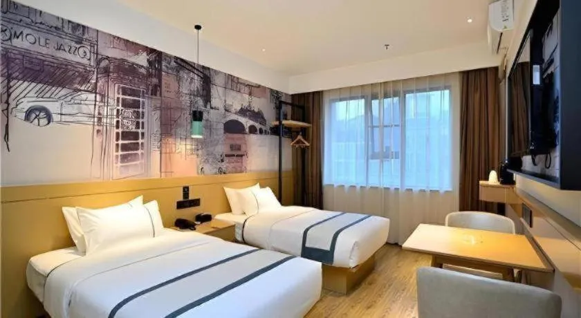 Bed in City Comfort Inn Kunming Xi'an Kang Road