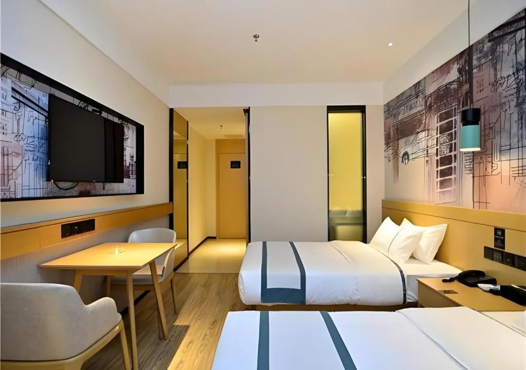 Bed in City Comfort Inn Kunming Xi'an Kang Road