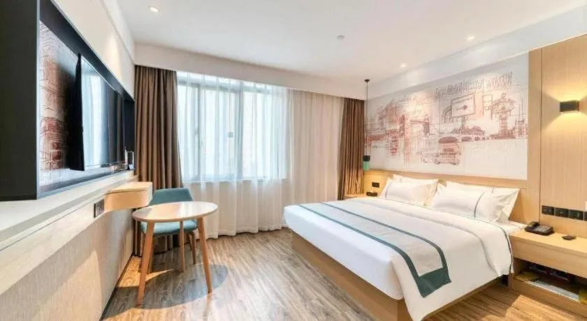 Bed in City Comfort Inn Kunming Xi'an Kang Road