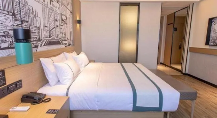 Bed in City Comfort Inn Kunming Xi'an Kang Road