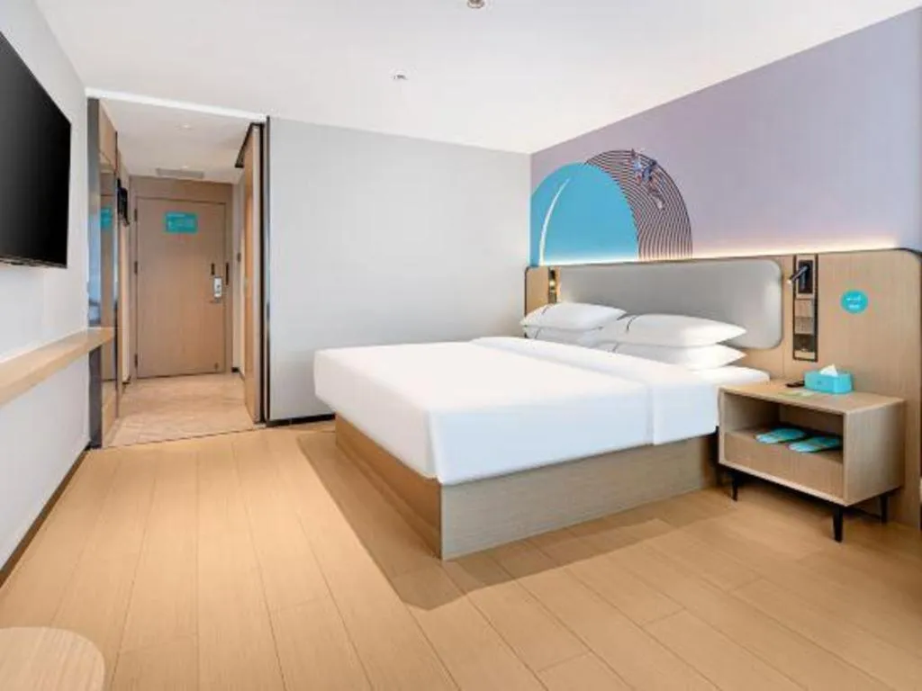 Bed in City Comfort Inn Kunming Xi'an Kang Road