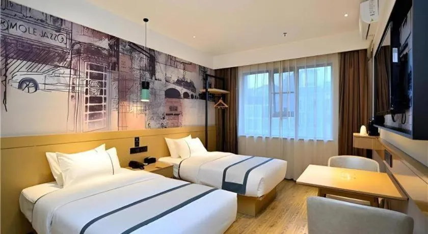 Bed in City Comfort Inn Kunming Xi'an Kang Road