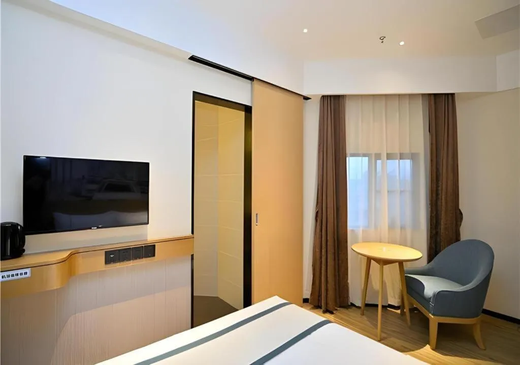 Bed in City Comfort Inn Kunming Xi'an Kang Road