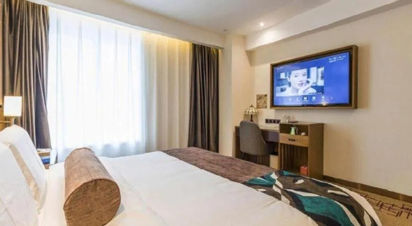 Bed in James Joyce Coffetel Zhengzhou Beilong Wetland Park