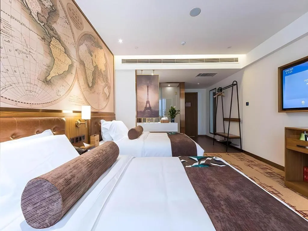 Bed in James Joyce Coffetel Zhengzhou Beilong Wetland Park