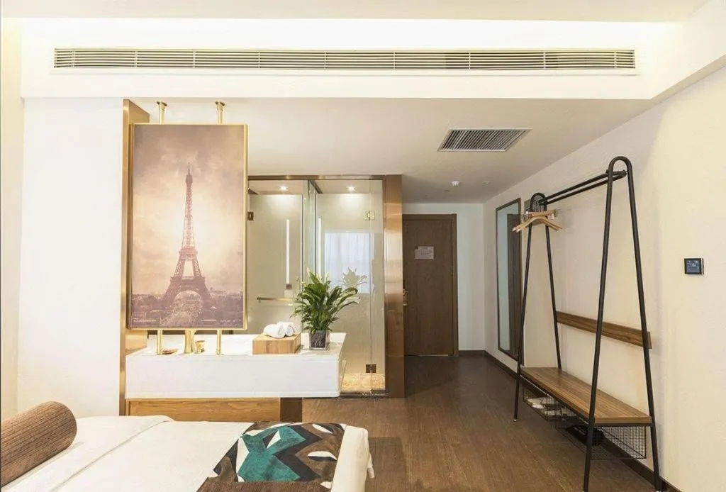 Bed in James Joyce Coffetel Zhengzhou Beilong Wetland Park