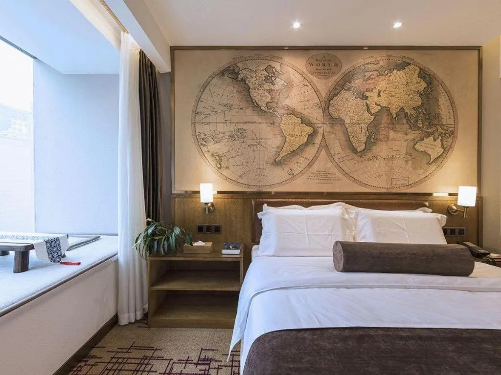 Bed in James Joyce Coffetel Zhengzhou Beilong Wetland Park