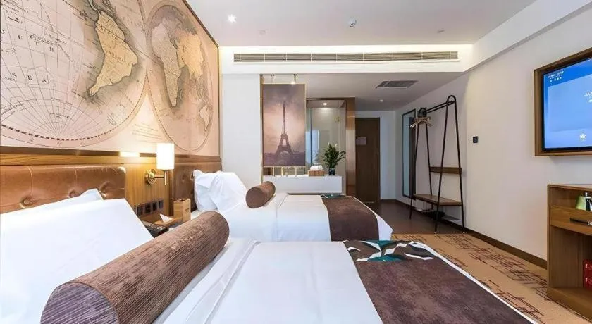 Bed in James Joyce Coffetel Zhengzhou Beilong Wetland Park