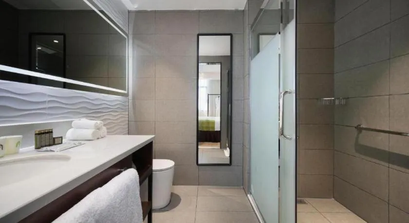 Bed in Campanile Hotel Shenzhen Bay Convention and Exhibition Center