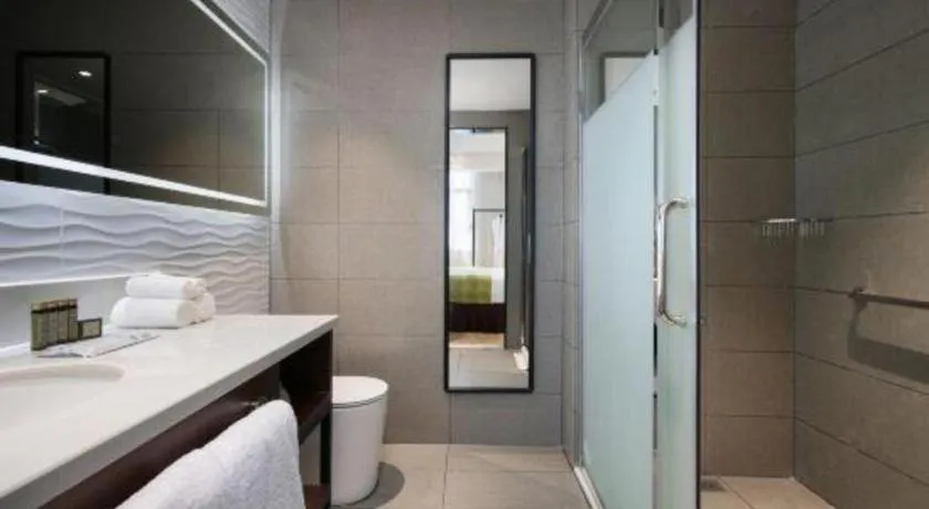 Bed in Campanile Hotel Shenzhen Bay Convention and Exhibition Center